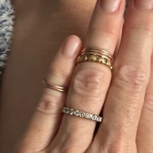 Platinum eternity band & diamonds.  Heart band 18kt gold.  5-14kt rose stackable